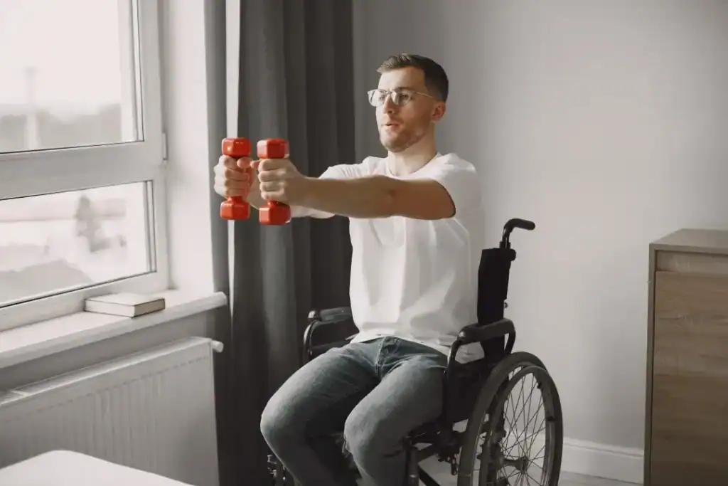 Empowering Weight Loss: A Comprehensive Guide for Individuals with Disabilities 1 Image of man doing exercise in his wheelchair to aid weight loss Wolverhampton