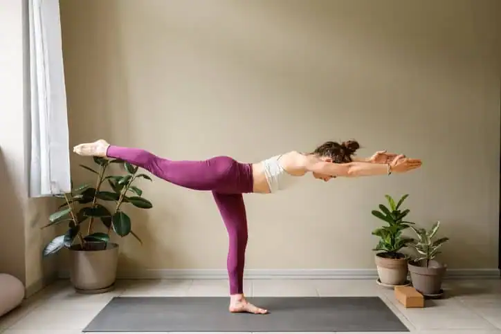 Achieving the Perfect Tone: How Often Should You Exercise for Results? 1 Woman doing Yoga exercise Wolverhampton to help with toning the body.