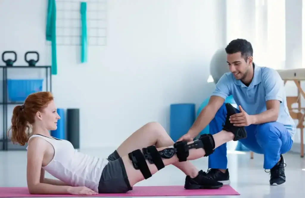 Debunking Meal Timing Myths: The Truth About Muscle Recovery 1 Woman having treatment to help muscle recovery Wolverhampton after an injury