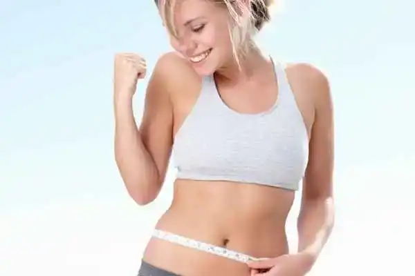 Unraveling the Mystery: Where Does the Body Fat Loss From First? 3 Image of woman happy with fat loss Wolverhampton